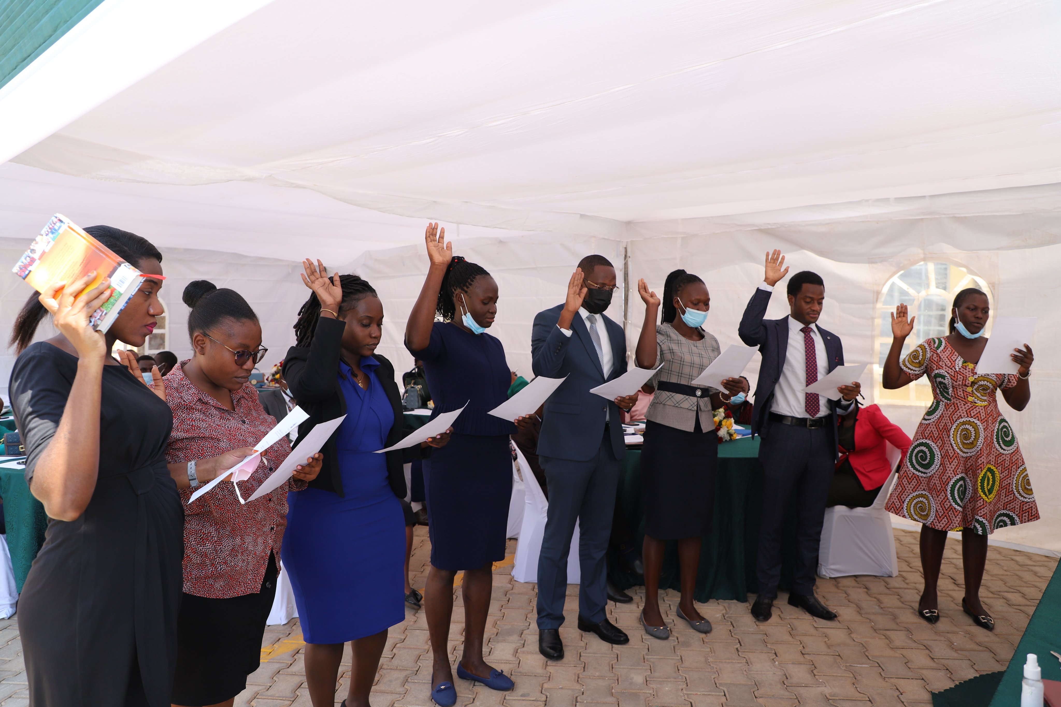 Newly appointed community service officers, and Government Analysts taking their oaths